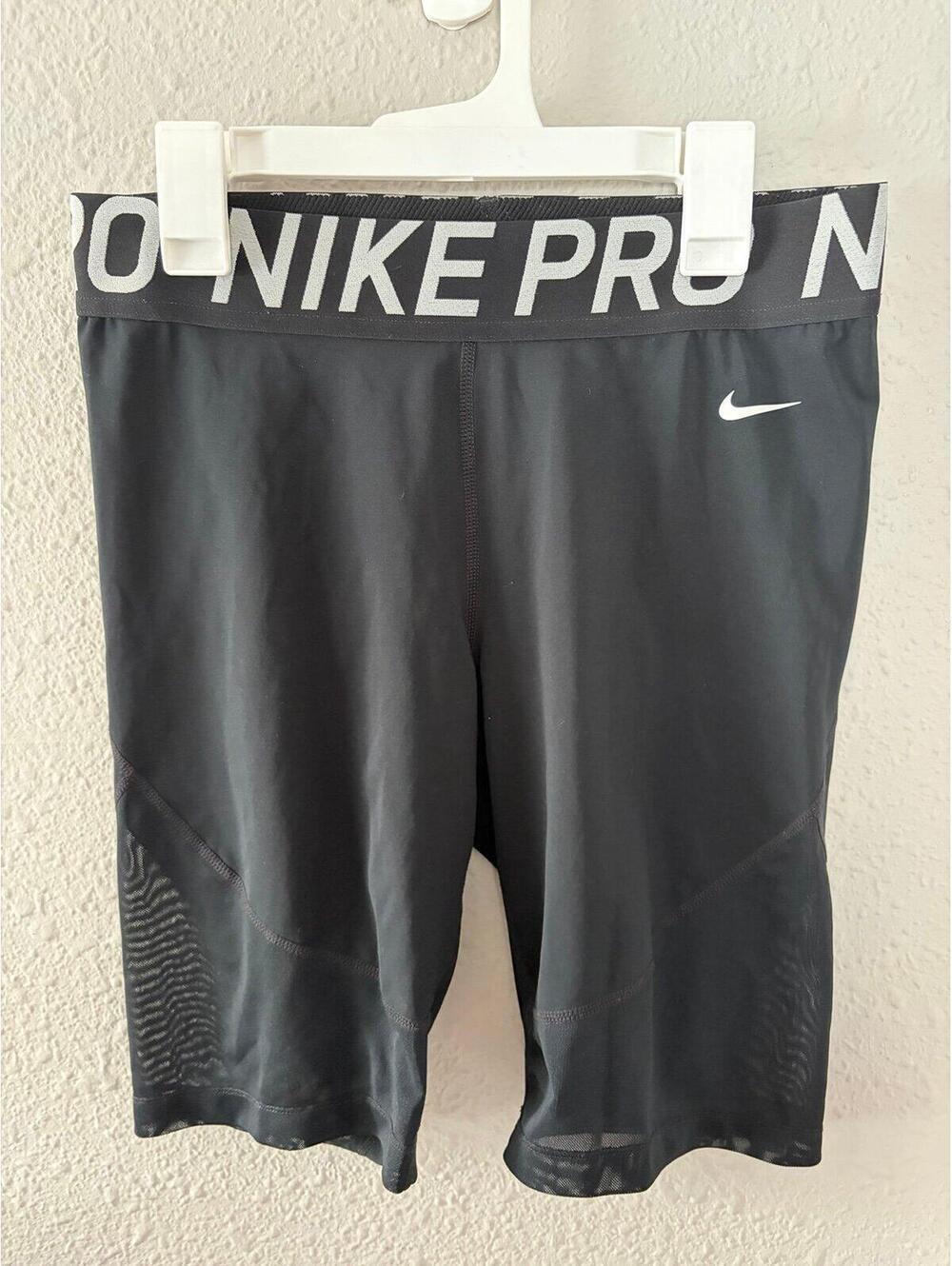 Nike Dri Fit Spandex Black size L. Inseam is 9in. Mesh bottom